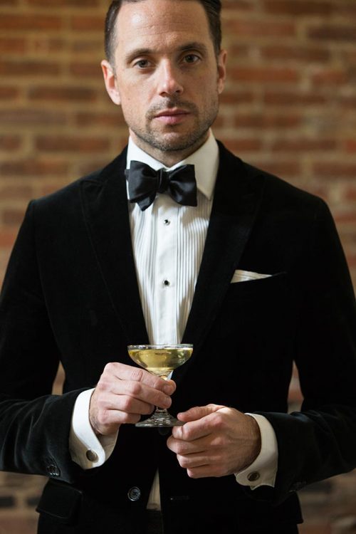 How To Hold a Champagne Glass - He Spoke Style