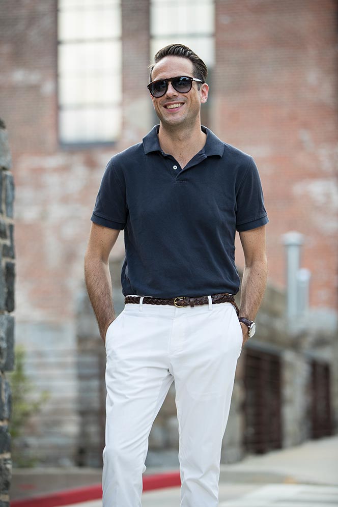 navy blue polo shirt white cotton pants simple casual mens summer outfit idea 8