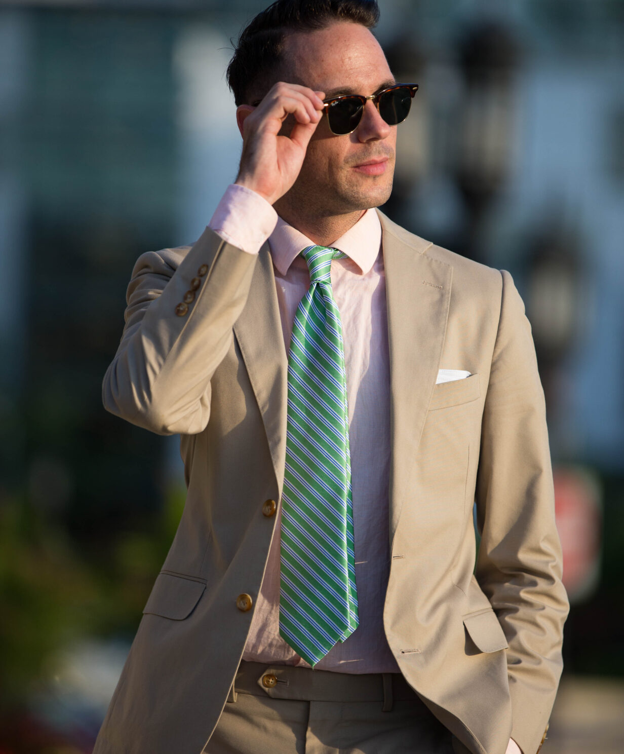 green suit pink shirt