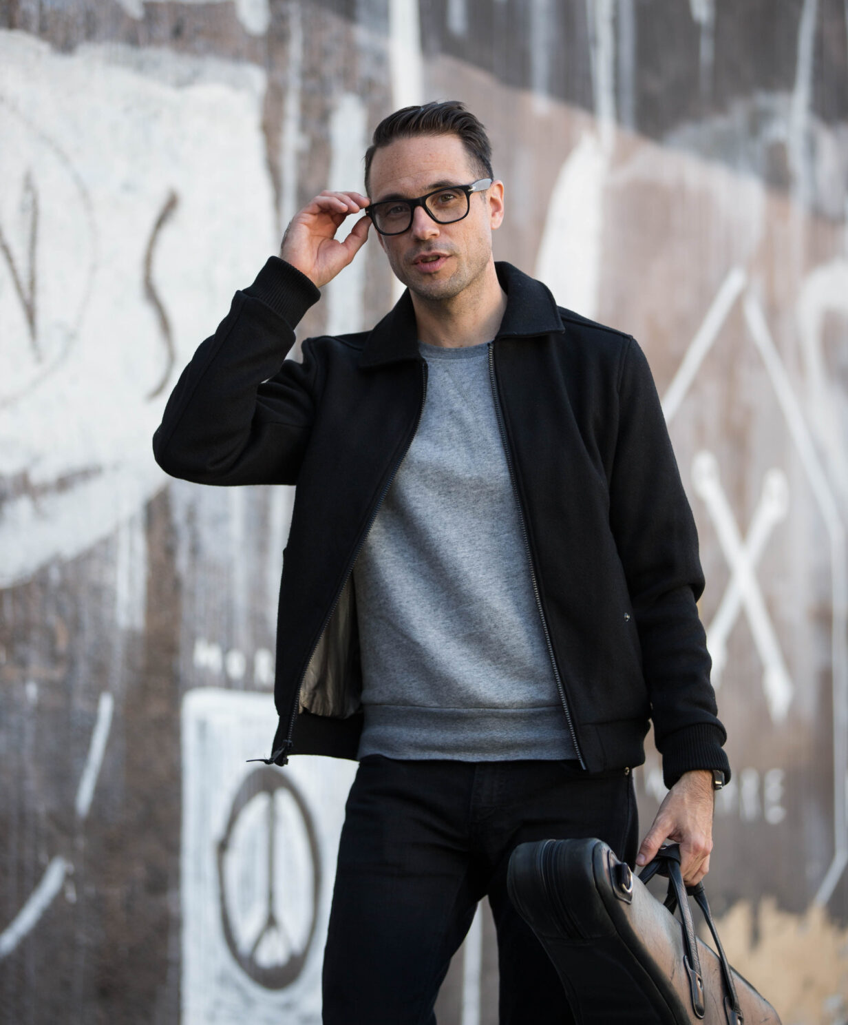 Black Wool Bomber with Jeans and White Sneakers