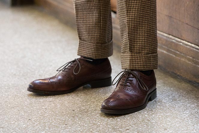 oxblood burgundy wingtip shoes with houndstooth pants