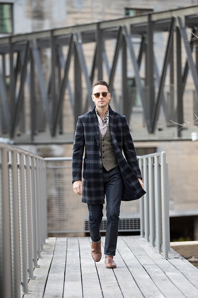 blue-plaid-coat-brown-gingham-shirt-vest-wearing-ascot-mens-sharp-casual-winter-outfit-ideas-with-boots-1