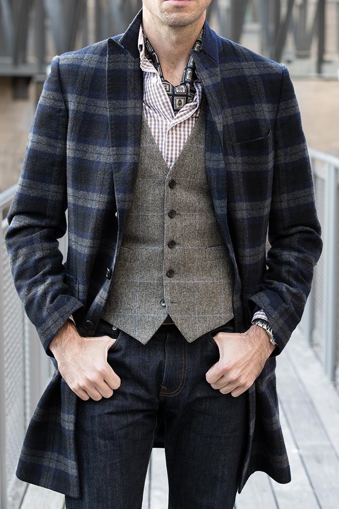 blue-plaid-coat-brown-gingham-shirt-vest-wearing-ascot-mens-sharp-casual-winter-outfit-ideas-with-boots-11