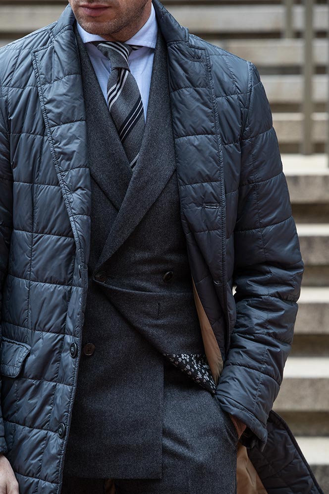 grey-flannel-double-breasted-suit-with-striped-drakes-tie-quilted-blue-jacket-mens-business-outfit-ideas-winter-1