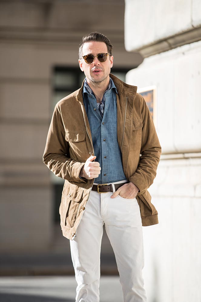 tan-suede-safari-jacket-denim-shirt-white-jeans-brown-leather-chelsea-boots-mens-outfit-idea-spring-style-essentials-peter-millar