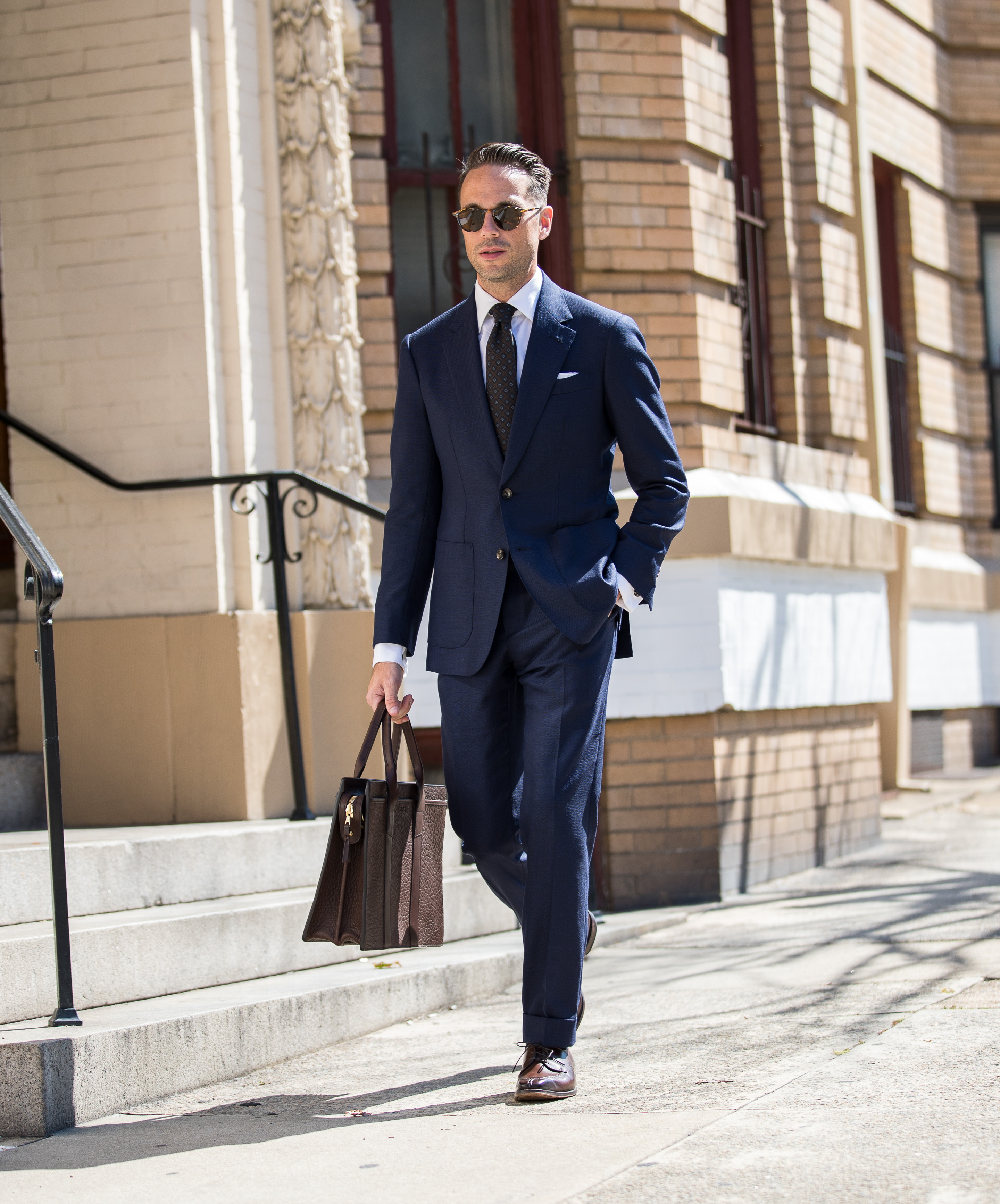 navy-hopsack-suit-with-brown-medallion-tie-outfit | He Spoke Style