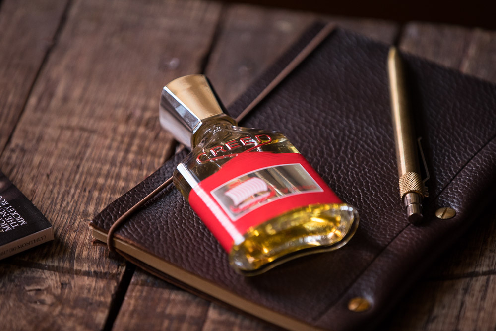 creed perfume red bottle