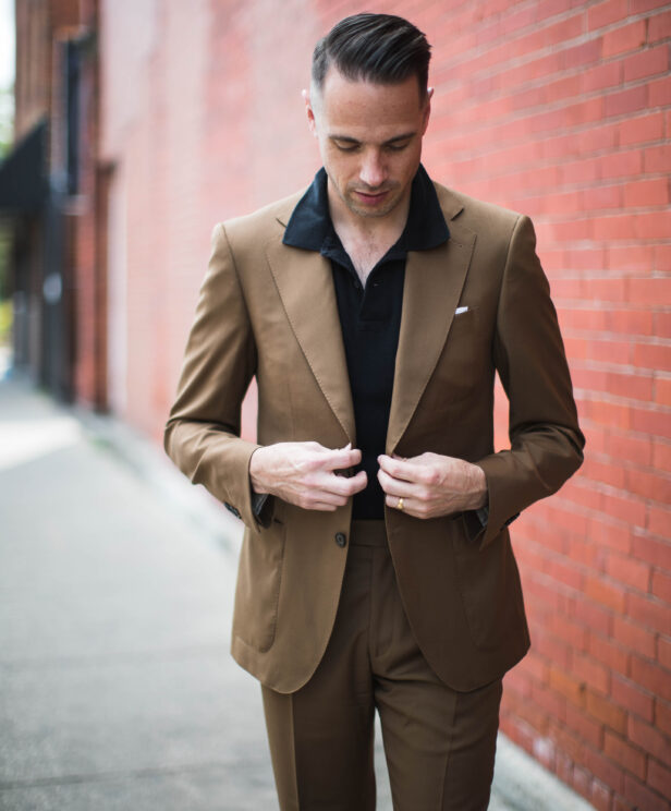 Terra Cotta Suit with Black Polo Shirt | He Spoke Style