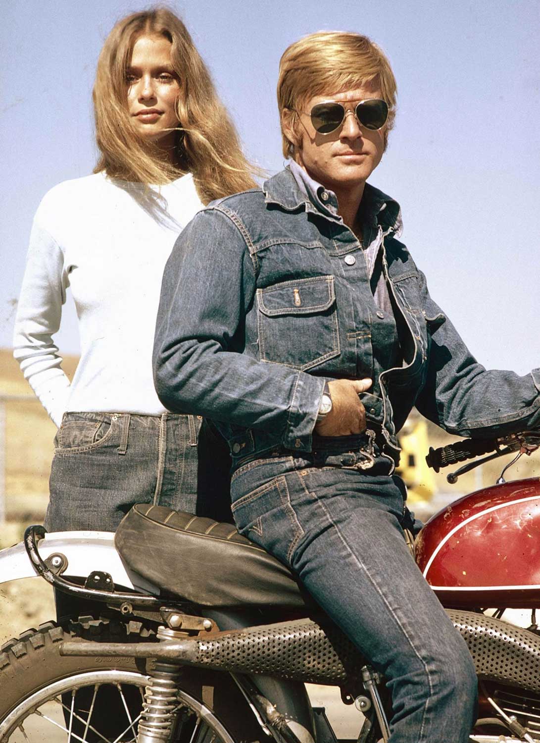 Robert Redford wearing a Canadian Tuxedo on a motorcycle