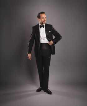 Model Wearing Black Wool Tuxedo – Sophisticated & Timeless Look