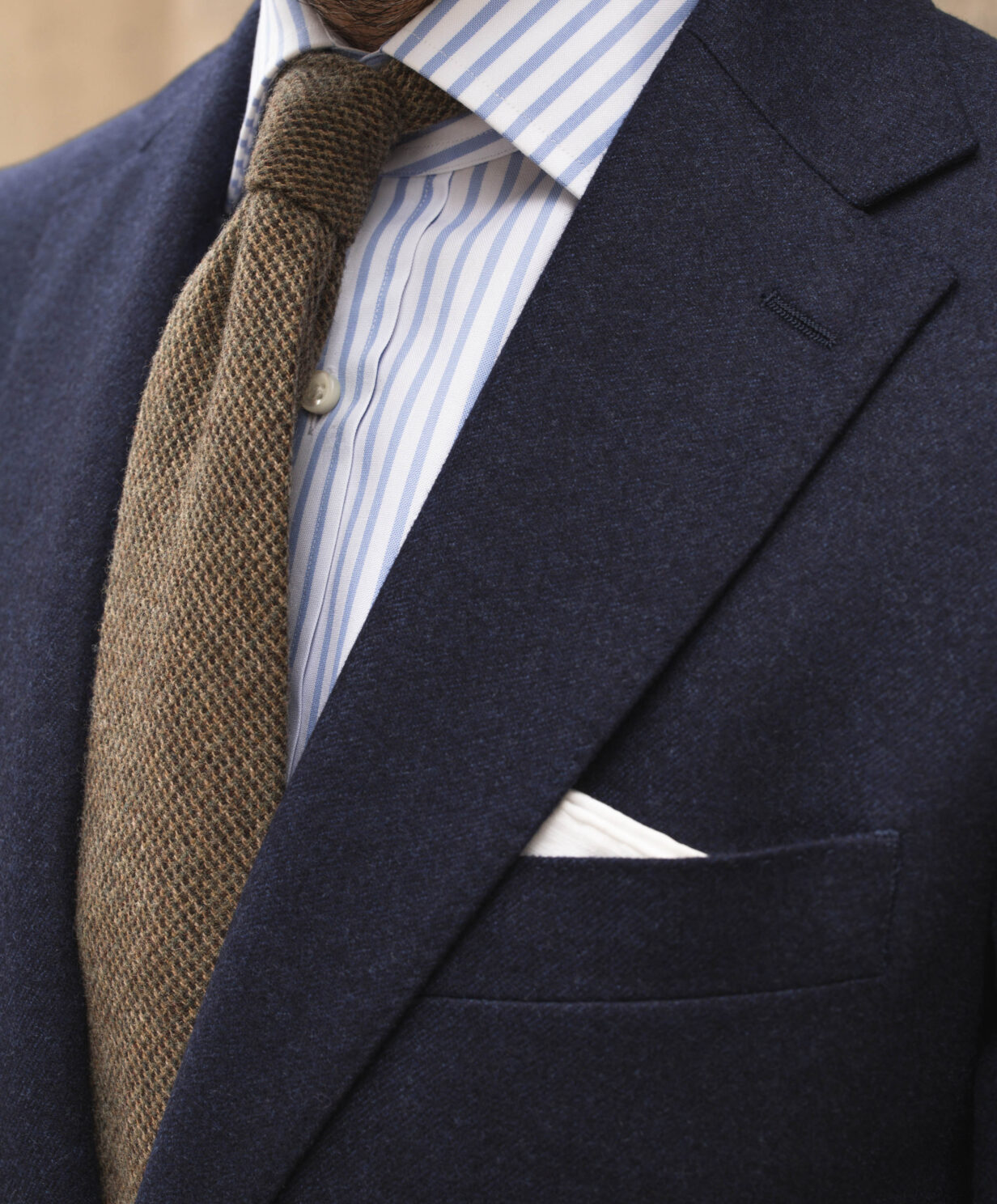 Navy Flannel Suit With Striped Shirt and Tan Tie | He Spoke Style