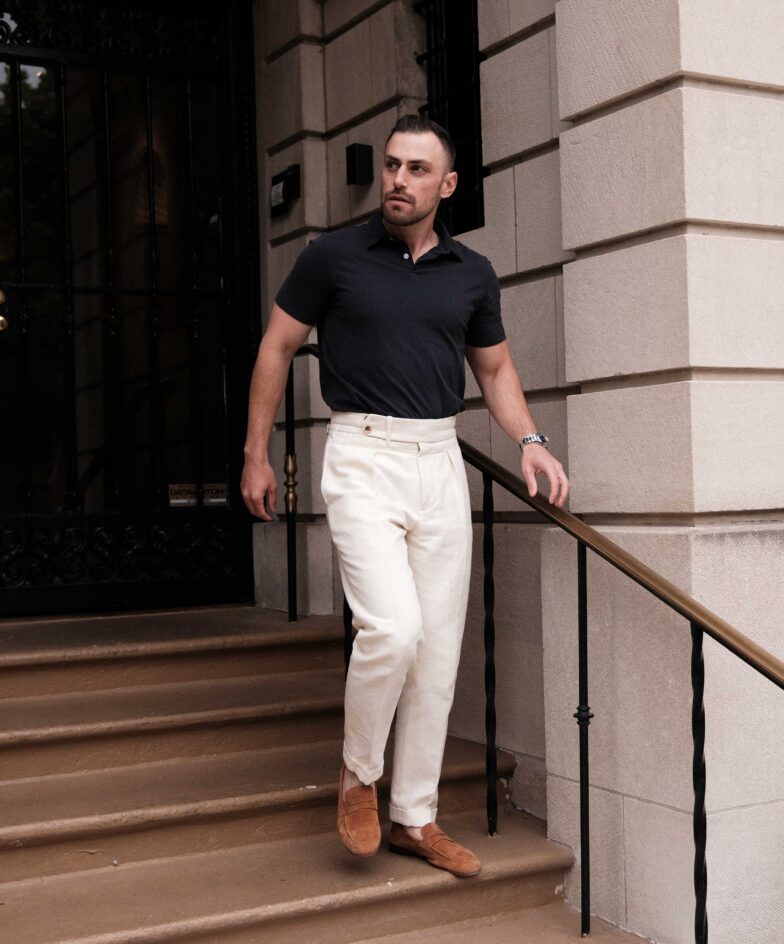 Black Polo Shirt with Cream Pants and Suede Loafers | He Spoke Style