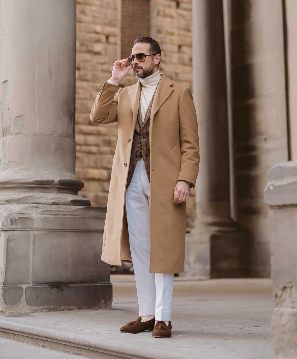 classic camel overcoat white pants turtleneck outfit idea