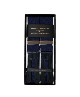 Navy moire suspenders with silver hardware and black leather ends, in a gift box