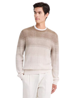 Taupe to cream gradient stripe crewneck sweater with herringbone knit, worn with ivory trousers by a model